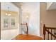 Welcoming foyer features hardwood floors and access to upstairs and downstairs at 2614 Laurelcherry St, Raleigh, NC 27612