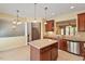 Well-lit kitchen features stainless steel appliances and kitchen island at 2614 Laurelcherry St, Raleigh, NC 27612
