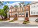 Charming townhomes featuring brick exteriors, front-entry garages, and manicured landscaping in a desirable neighborhood at 2614 Laurelcherry St, Raleigh, NC 27612