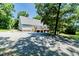 The home features a spacious back yard with a deck and a staircase at 2642 Holly Springs Church Rd, Broadway, NC 27505