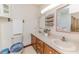Bathroom with a double sink vanity, toilet, and separate shower and bathtub in the mirror at 2642 Holly Springs Church Rd, Broadway, NC 27505
