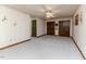 Spacious bedroom with neutral walls, carpet flooring, ceiling fan and multiple closets at 2642 Holly Springs Church Rd, Broadway, NC 27505