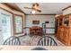 Cozy breakfast nook with wooden table set and built-in cabinet, perfect for casual dining at 2642 Holly Springs Church Rd, Broadway, NC 27505