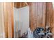Walk-in closet with golf clubs and storage solutions at 2642 Holly Springs Church Rd, Broadway, NC 27505