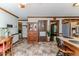 View of an open concept dining room with tiled flooring, a table and chairs at 2642 Holly Springs Church Rd, Broadway, NC 27505