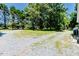 The property has a large gravel parking area that will accommodate many vehicles at 2642 Holly Springs Church Rd, Broadway, NC 27505