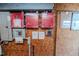 Close-up of an electrical room featuring multiple control panels, wiring, and detailed labeling at 2642 Holly Springs Church Rd, Broadway, NC 27505