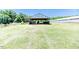 Exterior shot of a property showcasing a metal structure used for vehicle or equipment storage at 2642 Holly Springs Church Rd, Broadway, NC 27505