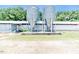 Exterior view of metal grain silos and outbuildings on a sunny day, surrounded by greenery at 2642 Holly Springs Church Rd, Broadway, NC 27505