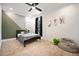 Fun bedroom with dinosaur themed decor, neutral carpet, and lots of natural light at 2713 Trifle Lane Ln, Wake Forest, NC 27587
