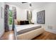Cozy bedroom features a comfortable bed, neutral decor, and natural light from windows at 2713 Trifle Lane Ln, Wake Forest, NC 27587