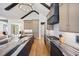 Spacious kitchen with an expansive island, custom cabinetry, and a view into the adjacent living area at 2713 Trifle Lane Ln, Wake Forest, NC 27587