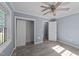Bedroom with closet, laminate floors, and natural light from the window at 282 Cooke Rd, Louisburg, NC 27549