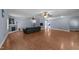Large living room features hardwood floors, a fireplace, an open floor plan, and plenty of space for comfortable living at 282 Cooke Rd, Louisburg, NC 27549