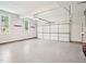 This garage has a freshly epoxied floor at 305 Promontory Point Dr, Cary, NC 27513