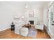 A cozy living room features a fireplace, hardwood floors, neutral furniture, and lots of natural light at 305 Promontory Point Dr, Cary, NC 27513
