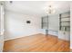 The living room has hardwood floors and built-in shelving at 305 Promontory Point Dr, Cary, NC 27513