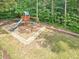 This large playground is equipped with a slide and swings at 305 Promontory Point Dr, Cary, NC 27513