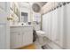 Clean bathroom with white fixtures, including a toilet, vanity, and shower-tub combination at 306 Berlin Way, Morrisville, NC 27560