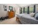Comfortable bedroom featuring two windows and stylish decor at 306 Berlin Way, Morrisville, NC 27560