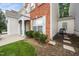 View of backyard featuring an outdoor grill and stone paver walkway at 306 Berlin Way, Morrisville, NC 27560