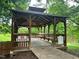 A gazebo overlooks the lake in this community common area at 306 Berlin Way, Morrisville, NC 27560