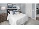 Comfortable bedroom features carpet floors, a bed, and decorative decor at 311 Rothbury Ct, Sanford, NC 27330