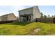 Home's backyard features mature landscaping, an outdoor gazebo, and privacy fence at 315 Watchmen Ln, Cameron, NC 28326