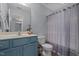 Bathroom shows a single vanity, toilet, bath tub, and shower curtain at 315 Watchmen Ln, Cameron, NC 28326