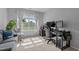 Bright bedroom with a cozy couch and work space bathed in natural light at 315 Watchmen Ln, Cameron, NC 28326