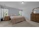 Spacious main bedroom with natural light and neutral colors at 315 Watchmen Ln, Cameron, NC 28326