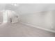 Spacious finished attic features neutral walls, plush carpet, and ample space at 33 E Ravano Dr, Clayton, NC 27527