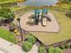 Community playground features slides, climbing structures, and a safety-first wood chip ground cover, for outdoor fun at 33 E Ravano Dr, Clayton, NC 27527