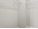 Spacious walk-in closet with white wire shelving for optimal organization at 33 E Ravano Dr, Clayton, NC 27527