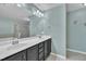 Bathroom with a double sink vanity, large mirror, and a separate shower and tub at 342 Westgrove Ct, Durham, NC 27703