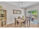 Charming dining room with views of an outdoor seating area at 342 Westgrove Ct, Durham, NC 27703
