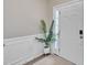 Bright entryway featuring fresh paint, and a stylish plant creates a welcoming first impression for guests at 342 Westgrove Ct, Durham, NC 27703