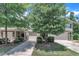 Charming townhome exterior with well-maintained landscaping and inviting facade in a suburban community at 342 Westgrove Ct, Durham, NC 27703