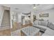 Bright open-concept living room with seamless flow between kitchen and dining at 342 Westgrove Ct, Durham, NC 27703