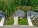 Stunning home with three-car garage, manicured lawn, and serene pond views at 4105 Bankshire Ln, Raleigh, NC 27603