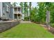 Multi level backyard with landscaping and screened porch at 4105 Bankshire Ln, Raleigh, NC 27603