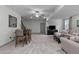 Open basement featuring a dining table, sofa, TV and natural light, perfect for entertaining or relaxing at 4105 Bankshire Ln, Raleigh, NC 27603