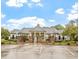 Community clubhouse featuring accessible entrance, landscaping and paved parking at 4105 Bankshire Ln, Raleigh, NC 27603