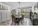 Dining room with large windows, offering plenty of natural light at 4105 Bankshire Ln, Raleigh, NC 27603