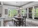Dining area with large windows and natural light at 4105 Bankshire Ln, Raleigh, NC 27603