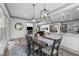 Open dining area with chandelier and seating for six at 4105 Bankshire Ln, Raleigh, NC 27603