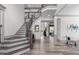 Elegant foyer with hardwood floors, grand staircase, and open layout at 4105 Bankshire Ln, Raleigh, NC 27603