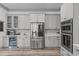 Bright kitchen features stainless steel appliances, ample cabinet space, and a beverage cooler at 4105 Bankshire Ln, Raleigh, NC 27603