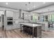 Kitchen with pendant lights, stainless appliances, and an island with seating at 4105 Bankshire Ln, Raleigh, NC 27603