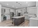 Modern kitchen with stainless steel appliances, kitchen island, and stylish cabinets at 4105 Bankshire Ln, Raleigh, NC 27603